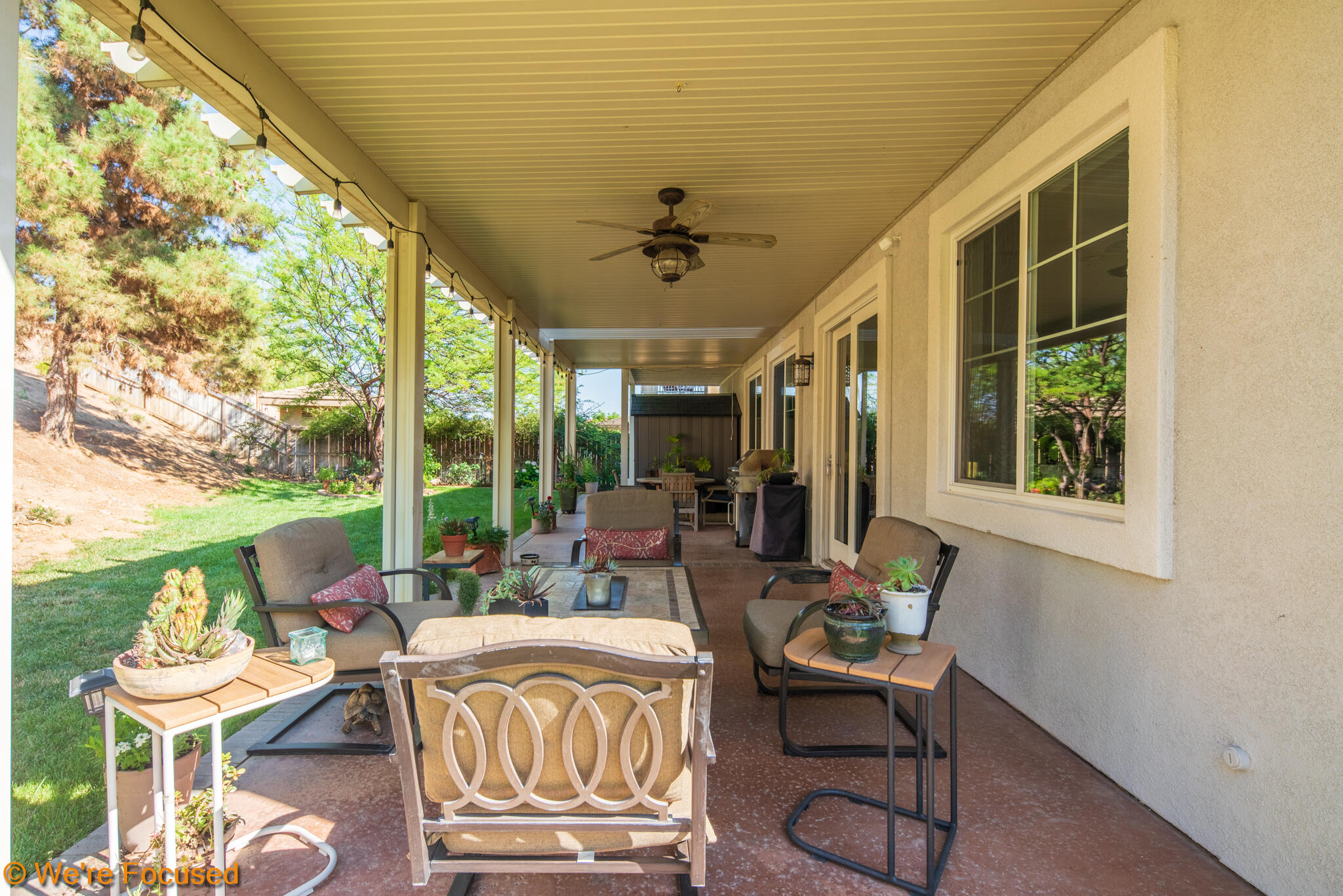 33856 Augusta Circle Yucaipa, CA 92399 - Photo 36 of 55 a living room with furniture and a large window