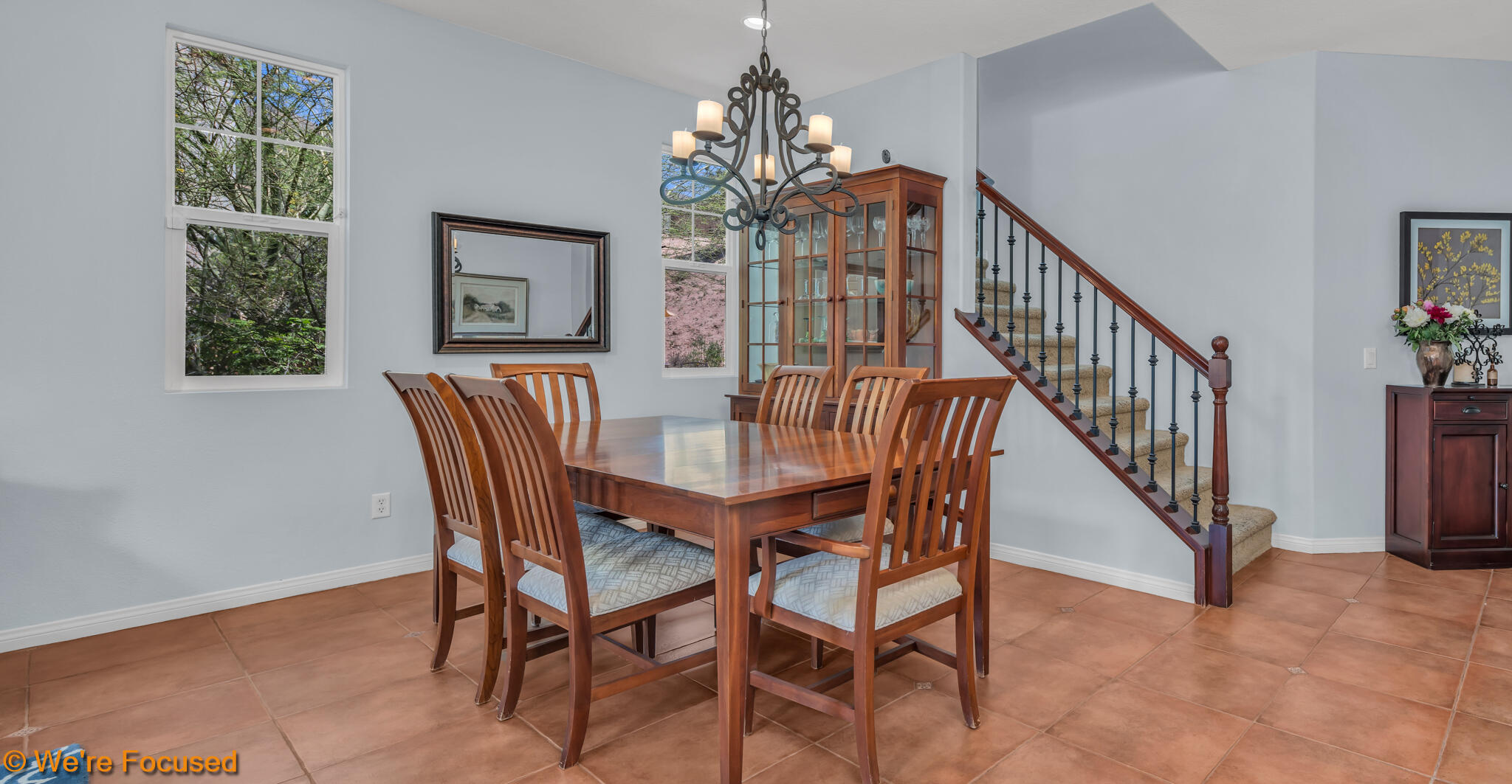 33856 Augusta Circle Yucaipa, CA 92399 - Photo 4 of 55 a view of a dining room with furniture and a chandelier