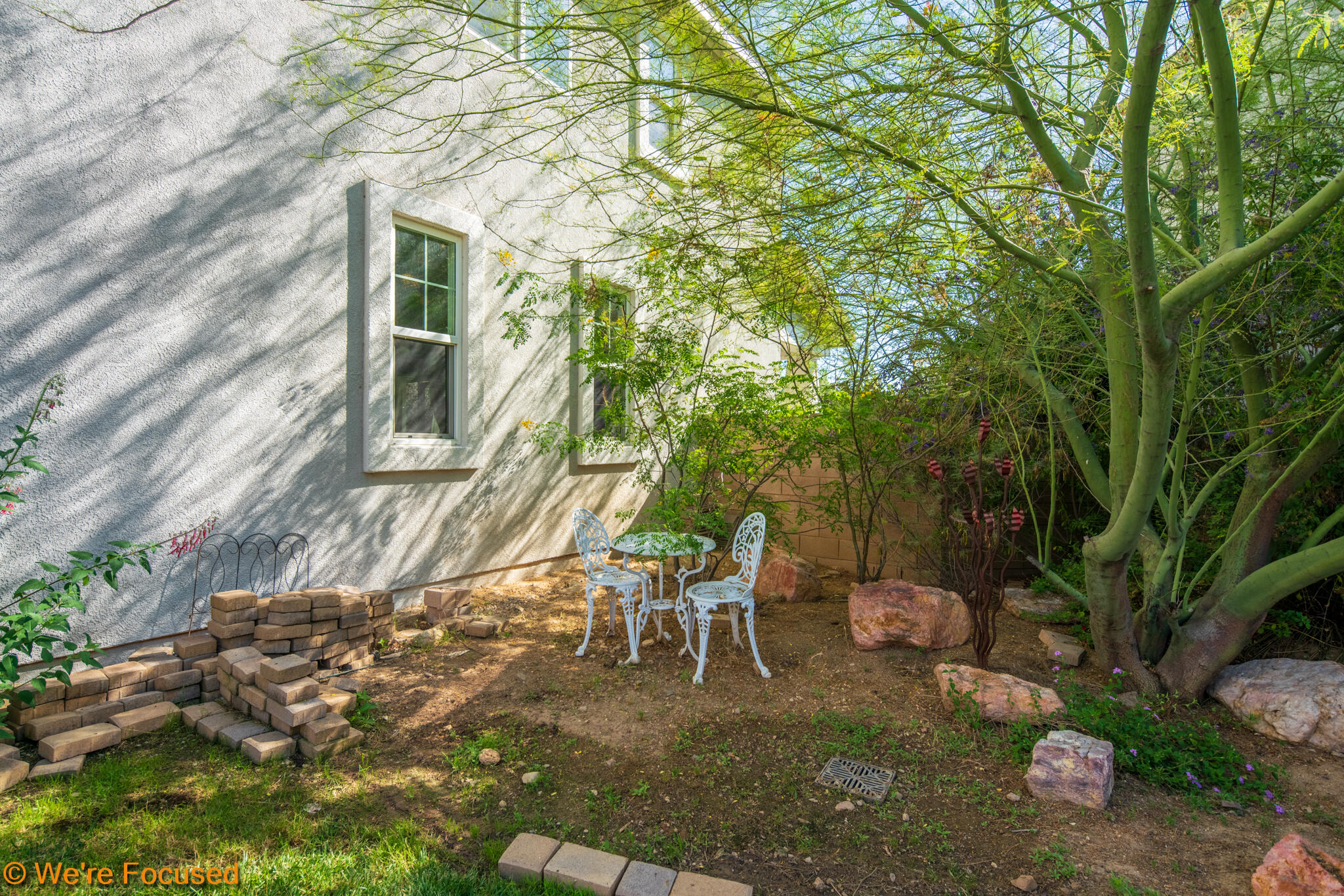 33856 Augusta Circle Yucaipa, CA 92399 - Photo 41 of 55 a view of a chairs and table in backyard