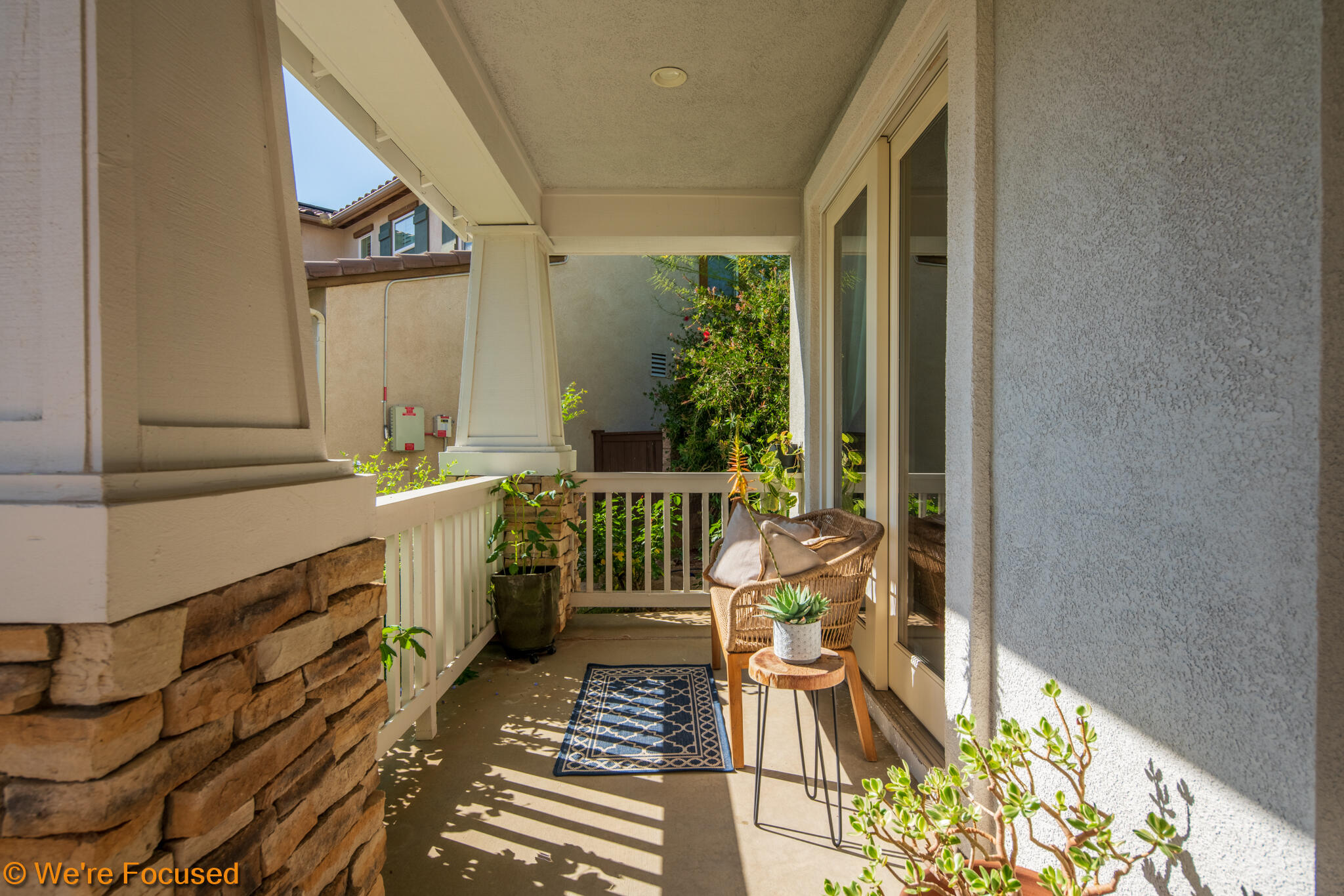 33856 Augusta Circle Yucaipa, CA 92399 - Photo 42 of 55 a living room with furniture and a floor to ceiling window