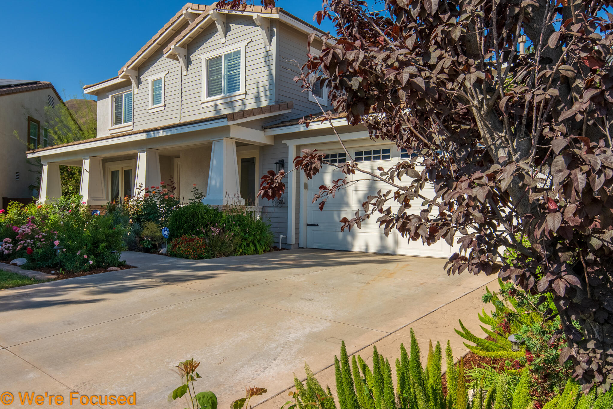 33856 Augusta Circle Yucaipa, CA 92399 - Photo 49 of 55 a front view of a house with a garden