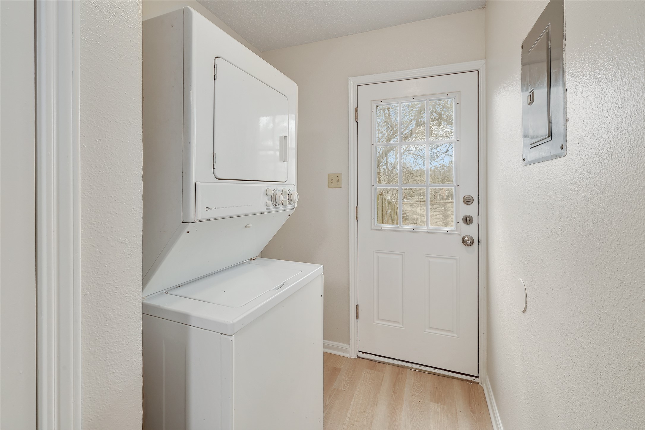 1915 Margalene Way Austin, TX 78728 - Photo 5 of 23 a utility room with closet dryer and washer