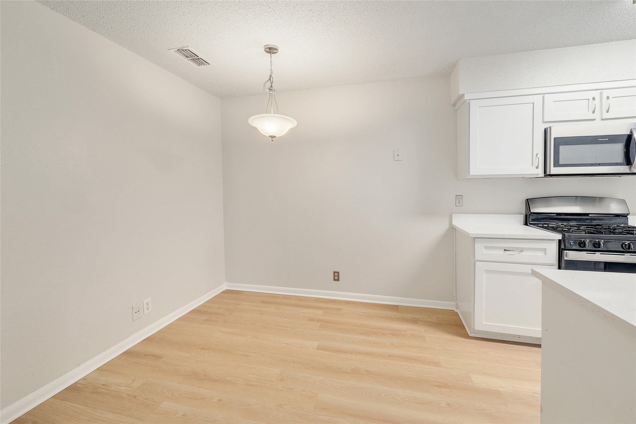 1915 Margalene Way Austin, TX 78728 - Photo 7 of 23 a view of a kitchen with a sink
