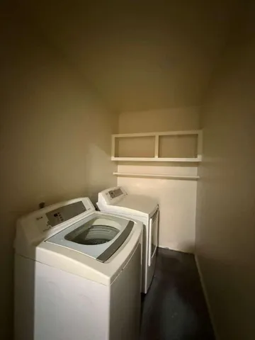 a view of a big room with staircase and windows