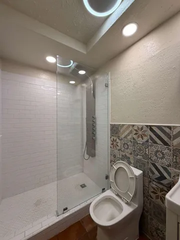 a bathroom with a sink and a toilet