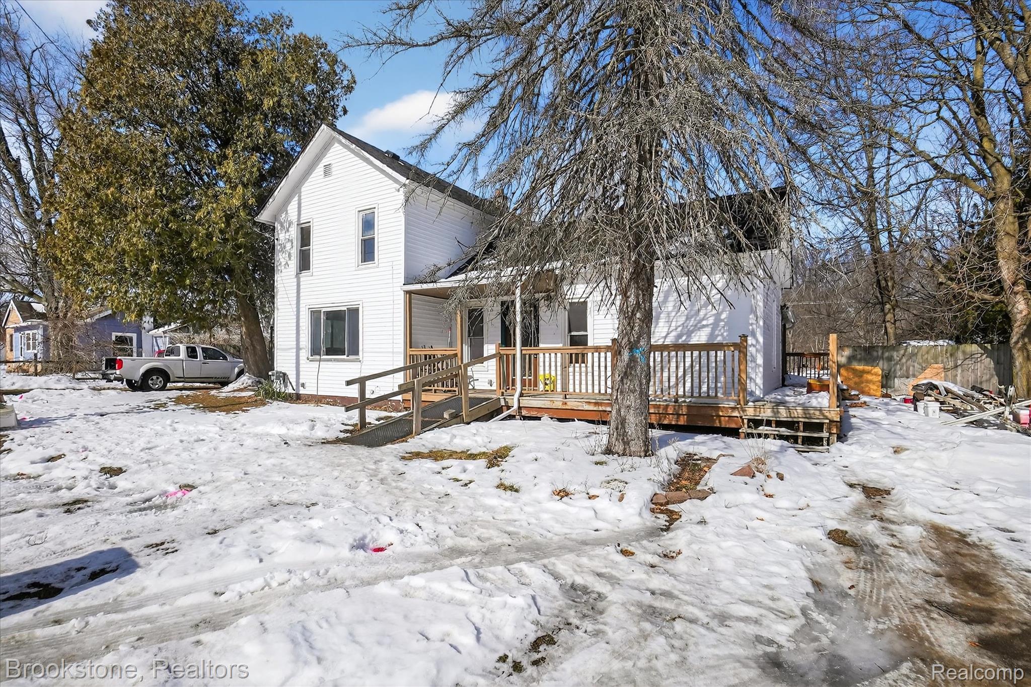 6756 West Beard Road Perry, MI 48872 - Photo 3 of 32 View of front of house with a wooden deck