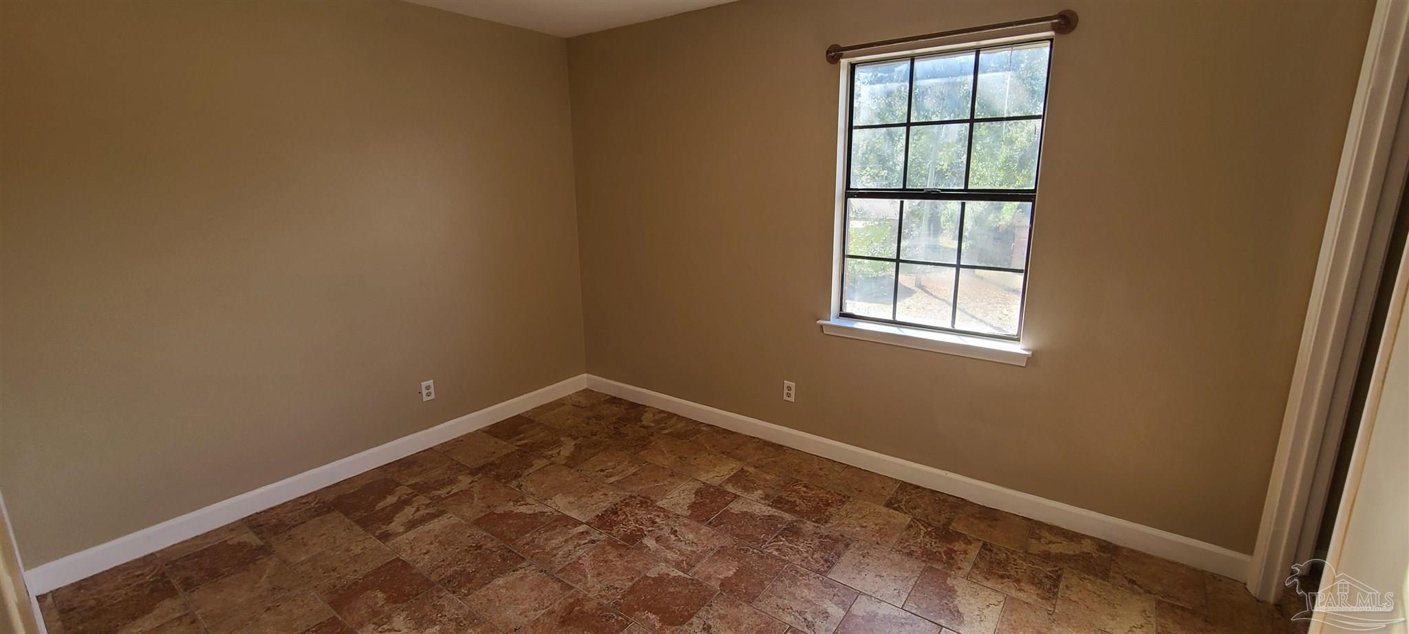 7250 Hilburn Road, Unit 4D Pensacola, FL 32504 - Photo 10 of 10 an empty room with windows