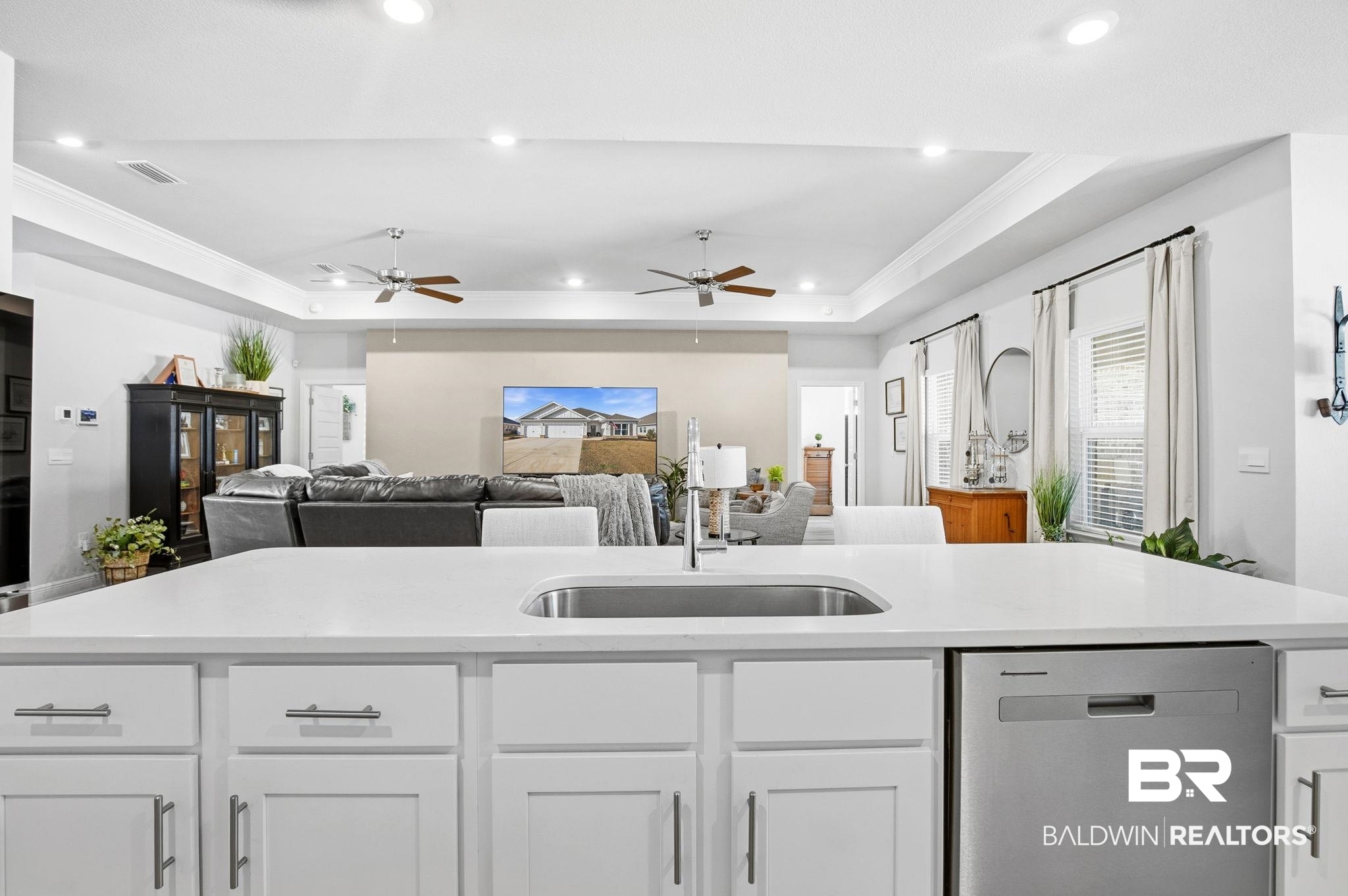 11123 Genuine Risk Circle Daphne, AL 36526 - Photo 67 of 67 Kitchen with white cabinetry, dishwasher, open floor plan, ornamental molding, and recessed lighting