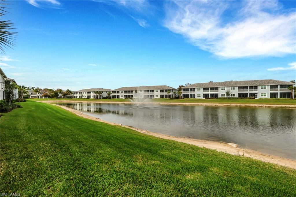 2647 Seychelles Circle, Unit 2202 Naples, FL 34112 - Photo 21 of 37 Water view featuring nearby suburban area