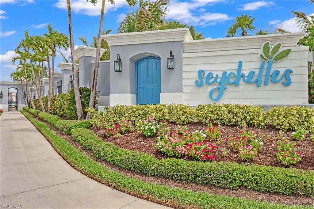 2647 Seychelles Circle, Unit 2202 Naples, FL 34112 - Photo 23 of 37 View of community sign