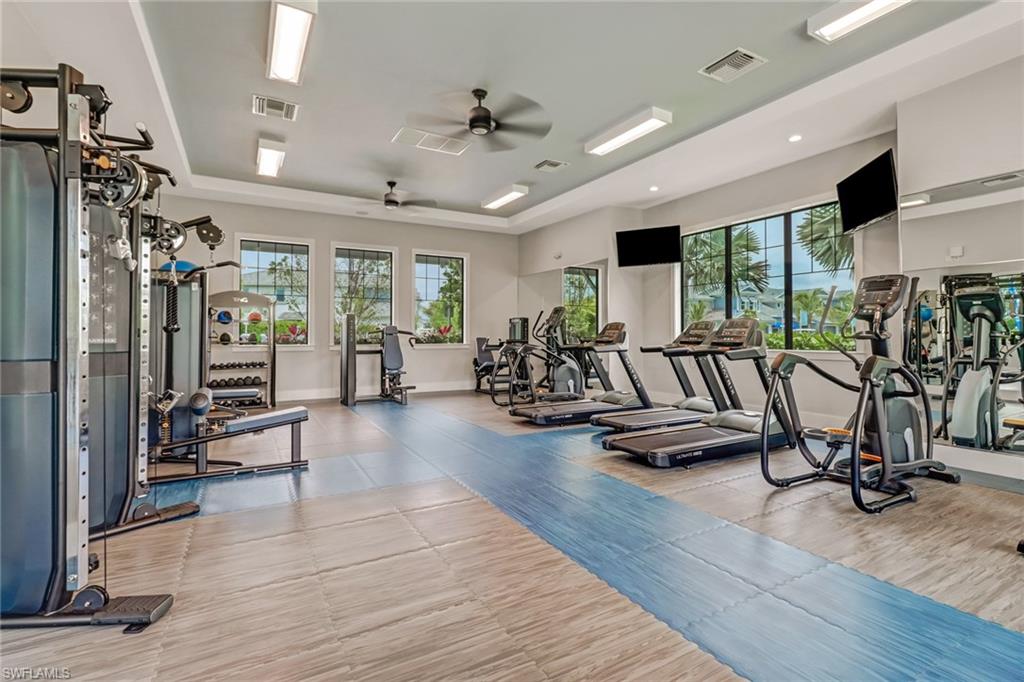 2647 Seychelles Circle, Unit 2202 Naples, FL 34112 - Photo 26 of 37 Gym featuring ceiling fan