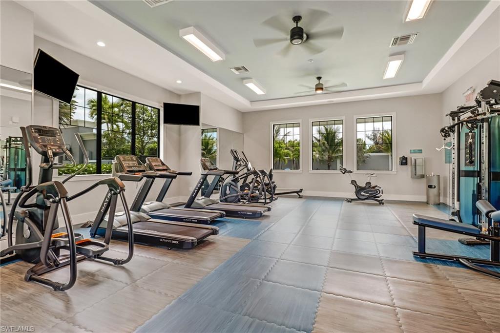 2647 Seychelles Circle, Unit 2202 Naples, FL 34112 - Photo 29 of 37 Workout area with ceiling fan