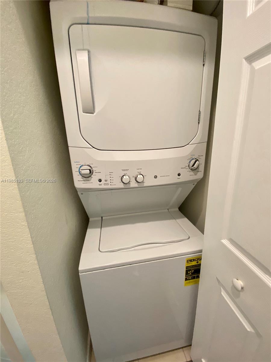 11489 Southwest 250th Street, Unit 11489 Homestead, FL 33032 - Photo 16 of 24 a utility room with dryer and washer
