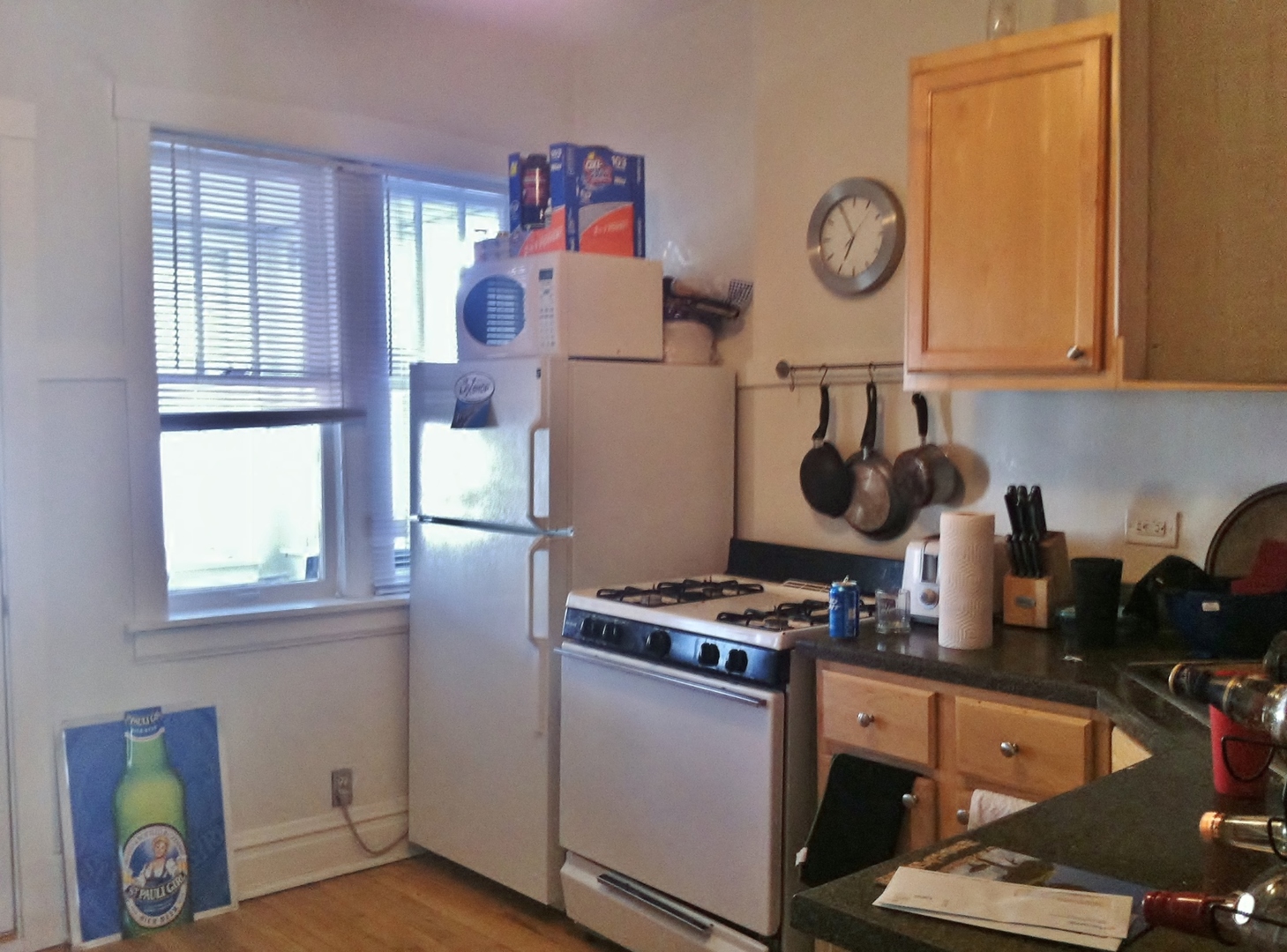 Undisclosed Address Chicago, IL 60614 - Photo 3 of 10 a kitchen with a refrigerator and a stove top oven