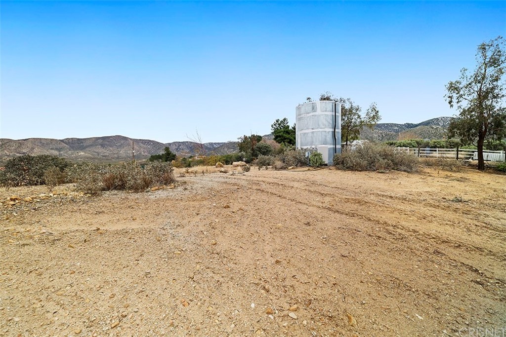 30231 Aliso Canyon Road Palmdale, CA 93550 - Photo 5 of 38 a view of a dry yard with mountain