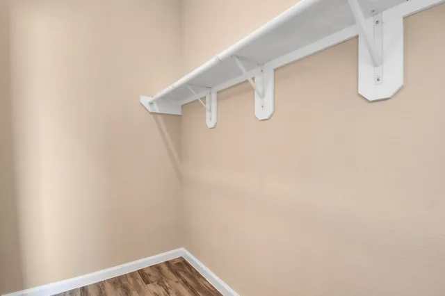 a view of small space with racks on the wall