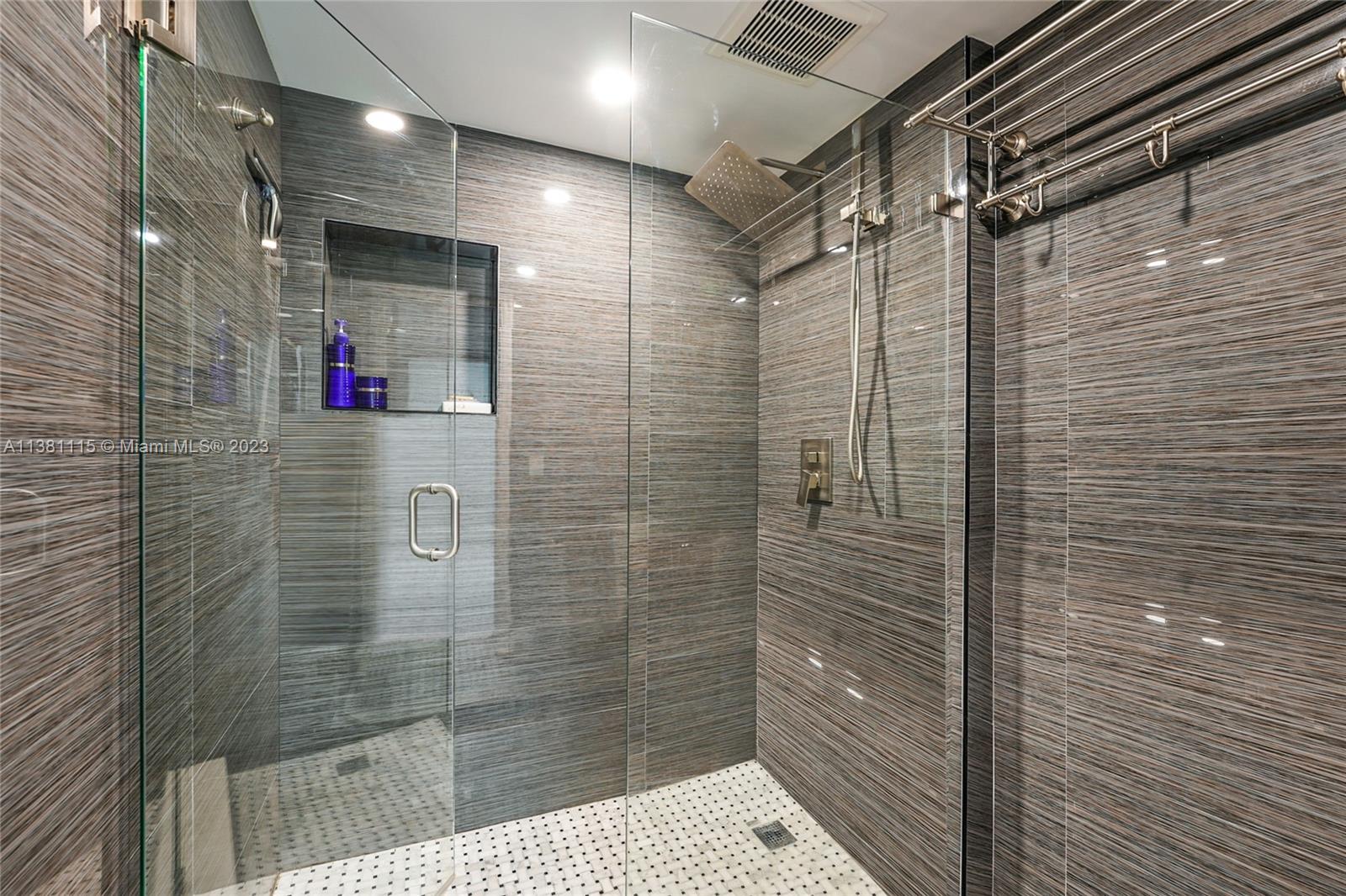 1665 Bay Road, Unit 417 Miami Beach, FL 33139 - Photo 11 of 15 a bathroom with a shower