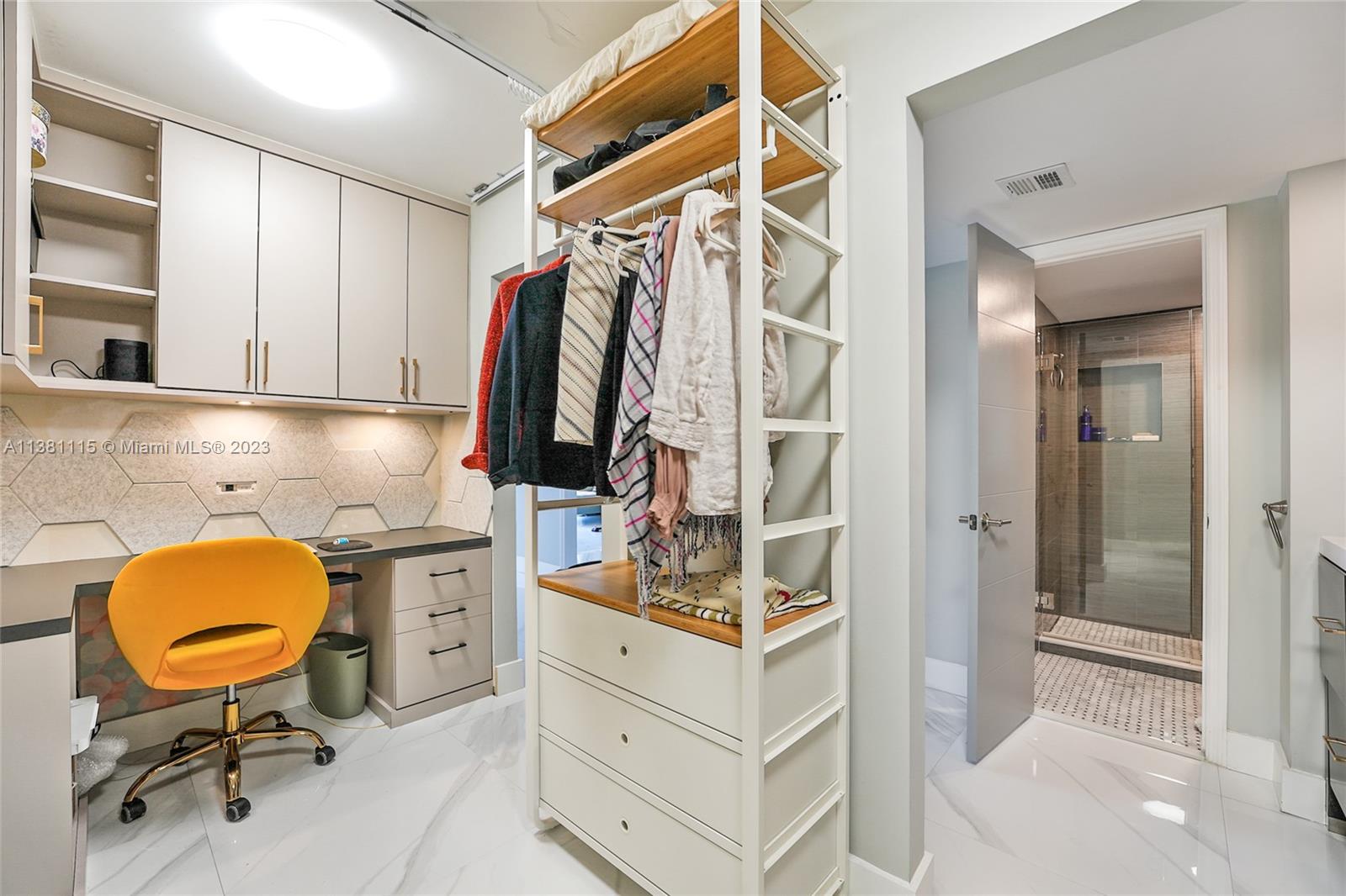 1665 Bay Road, Unit 417 Miami Beach, FL 33139 - Photo 10 of 15 a view of walk in closet and bathroom