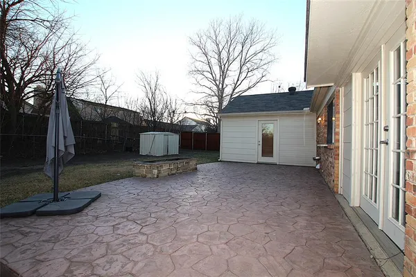 a view of a house with a yard and garage