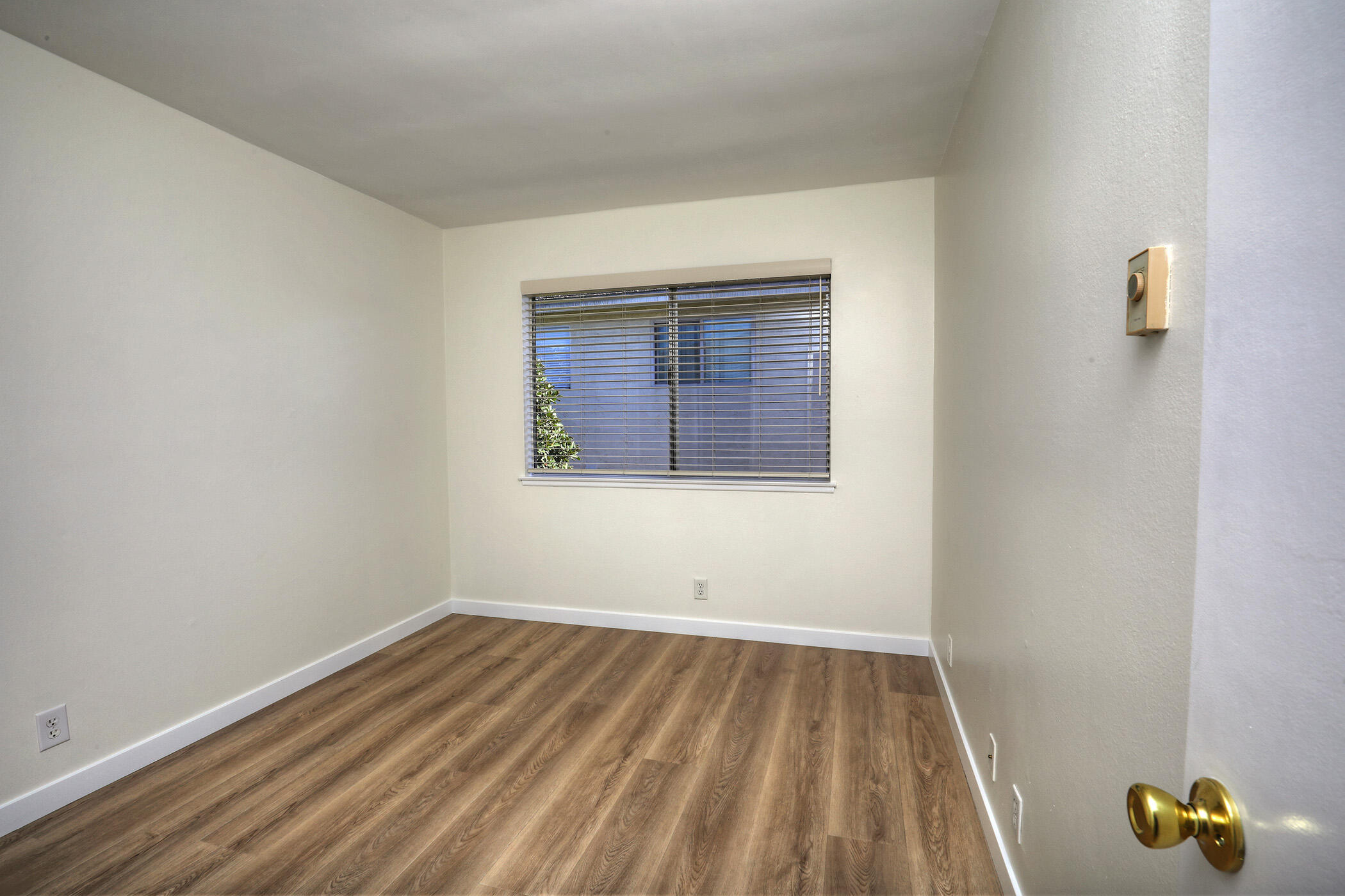 5945 Hickory Street, Unit 4 Carpinteria, CA 93013 - Photo 8 of 19 a view of wooden floor in a room