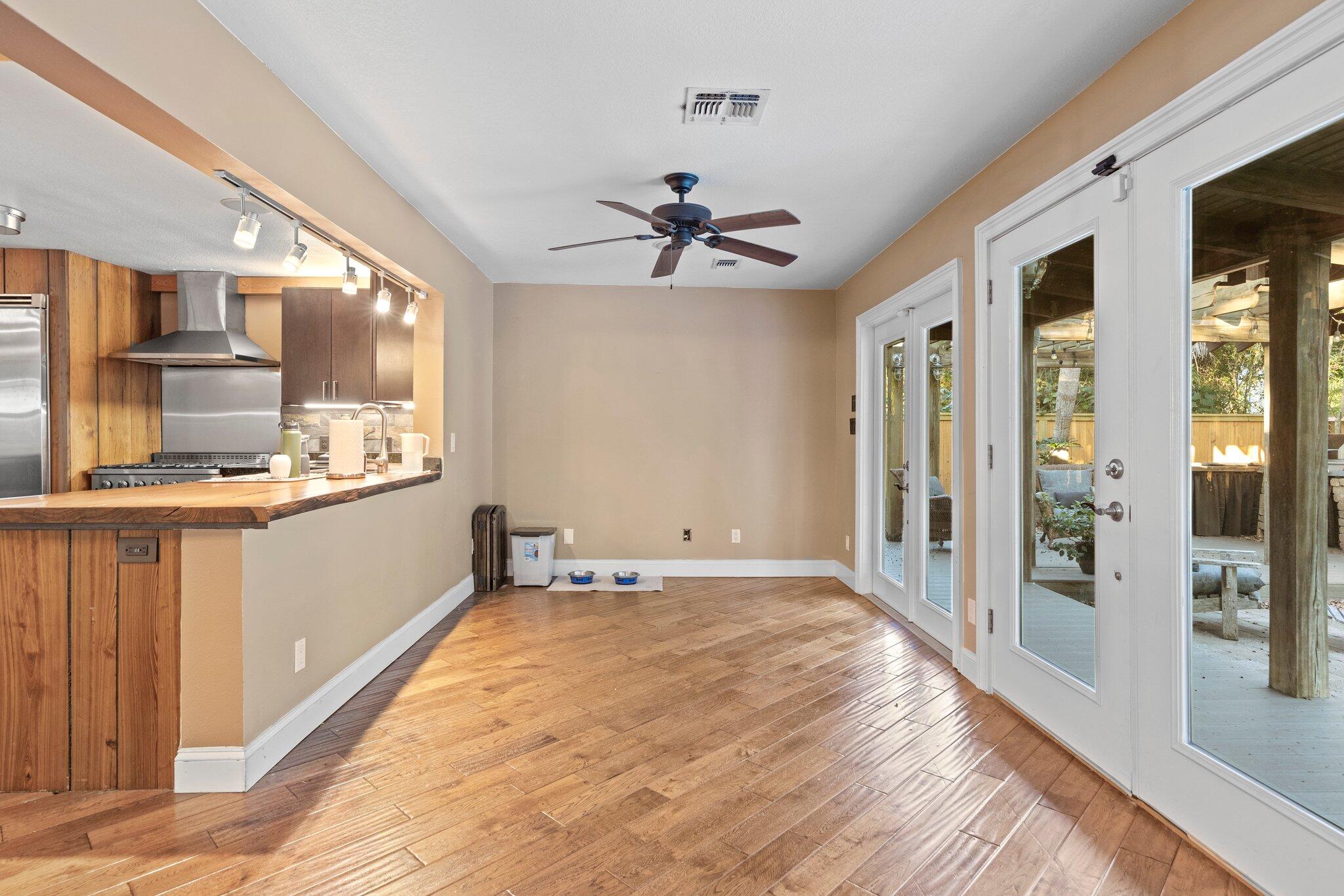 704 Main Street Destin, FL 32541 - Photo 13 of 59 a very nice looking room with a large window