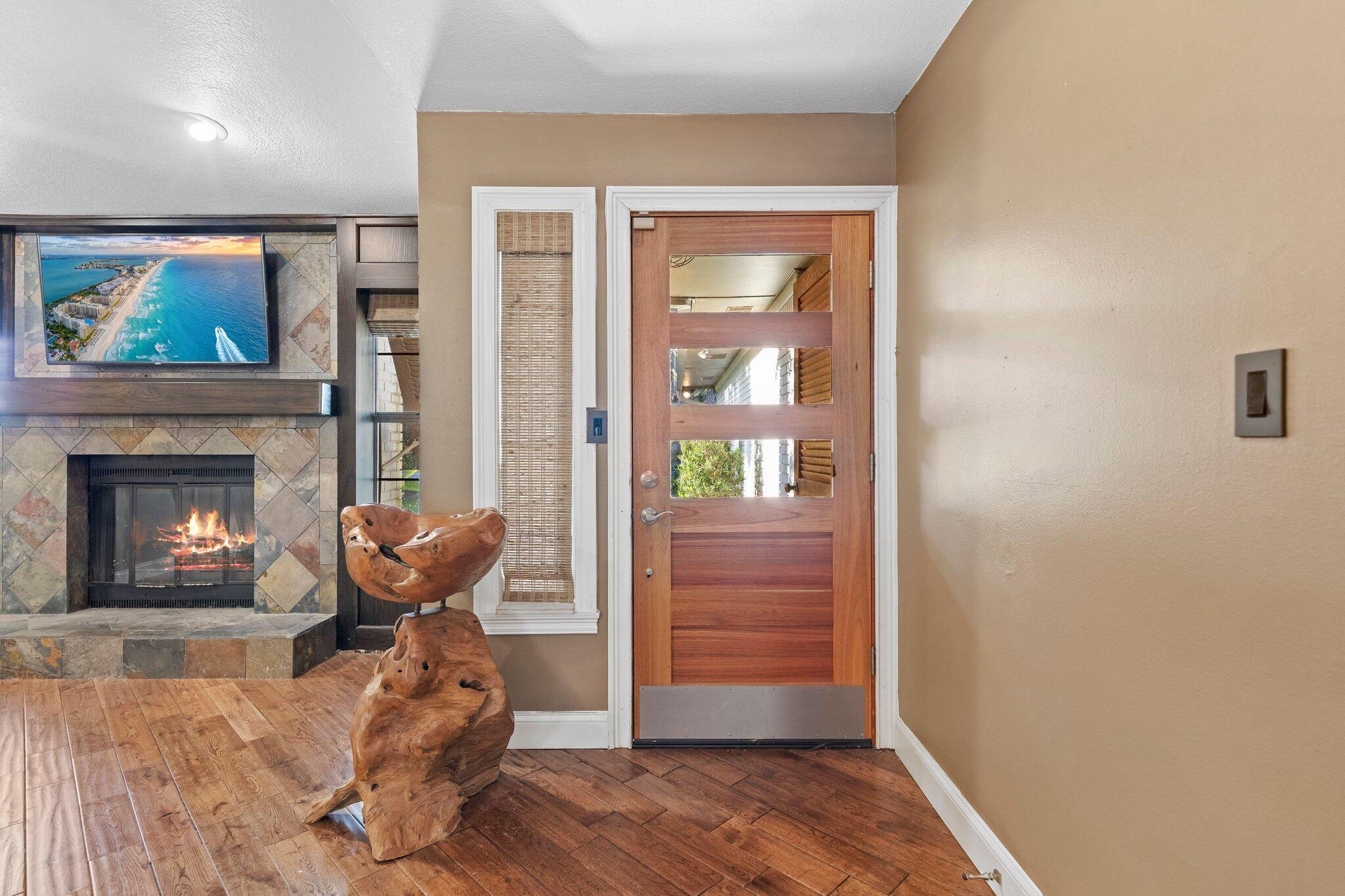 704 Main Street Destin, FL 32541 - Photo 2 of 59 a living room with furniture and a fireplace
