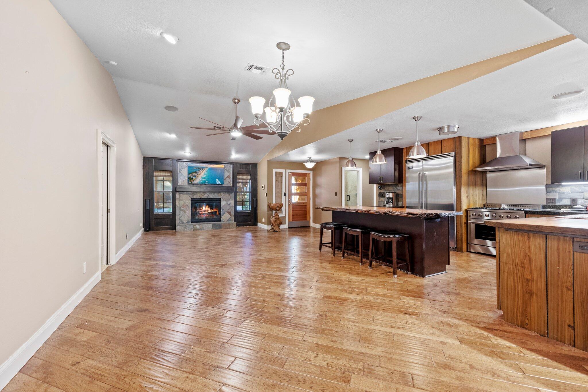 704 Main Street Destin, FL 32541 - Photo 24 of 59 a living room with stainless steel appliances kitchen island furniture and a kitchen view