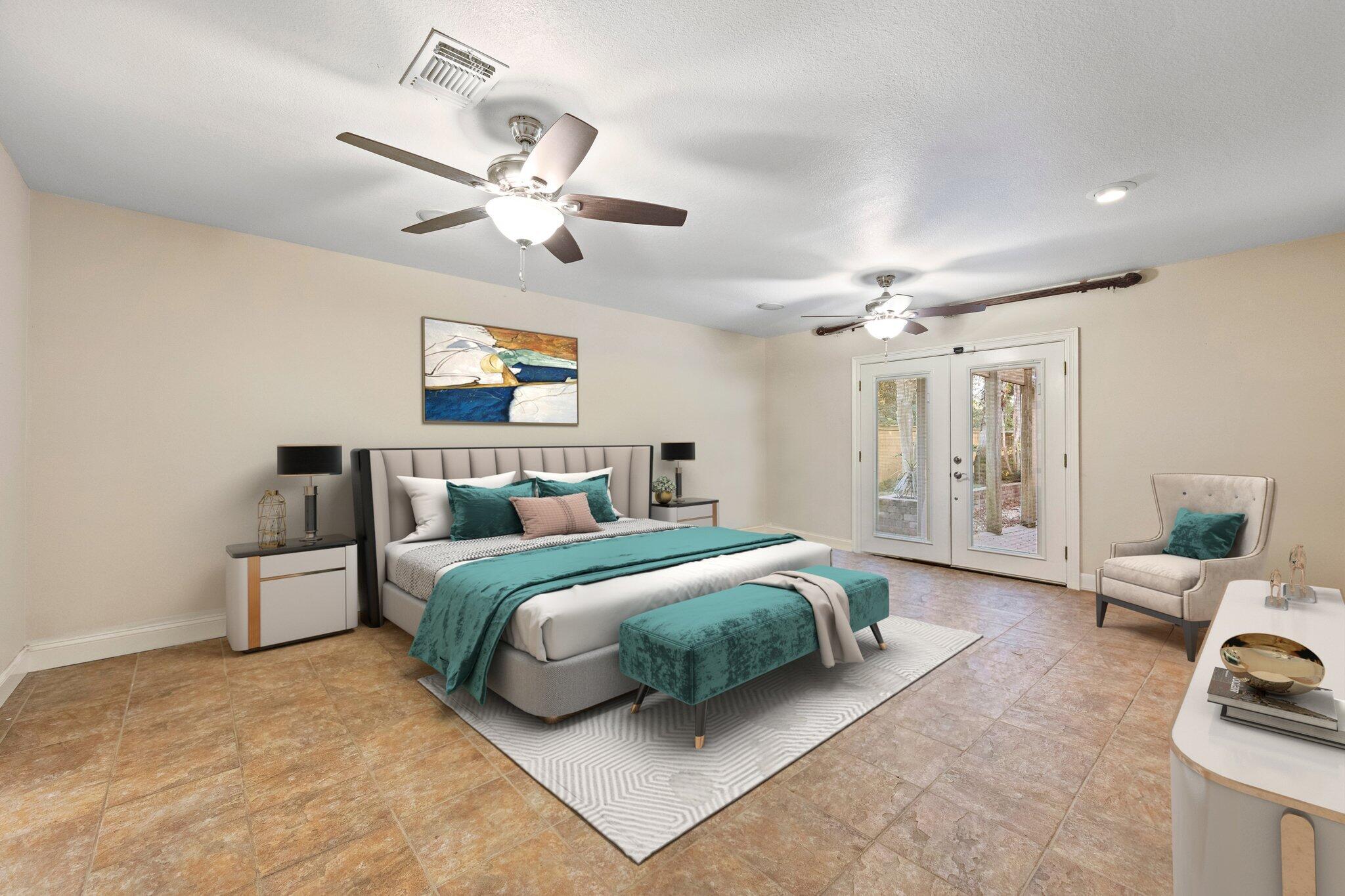 704 Main Street Destin, FL 32541 - Photo 34 of 59 a spacious bedroom with a bed couch and window