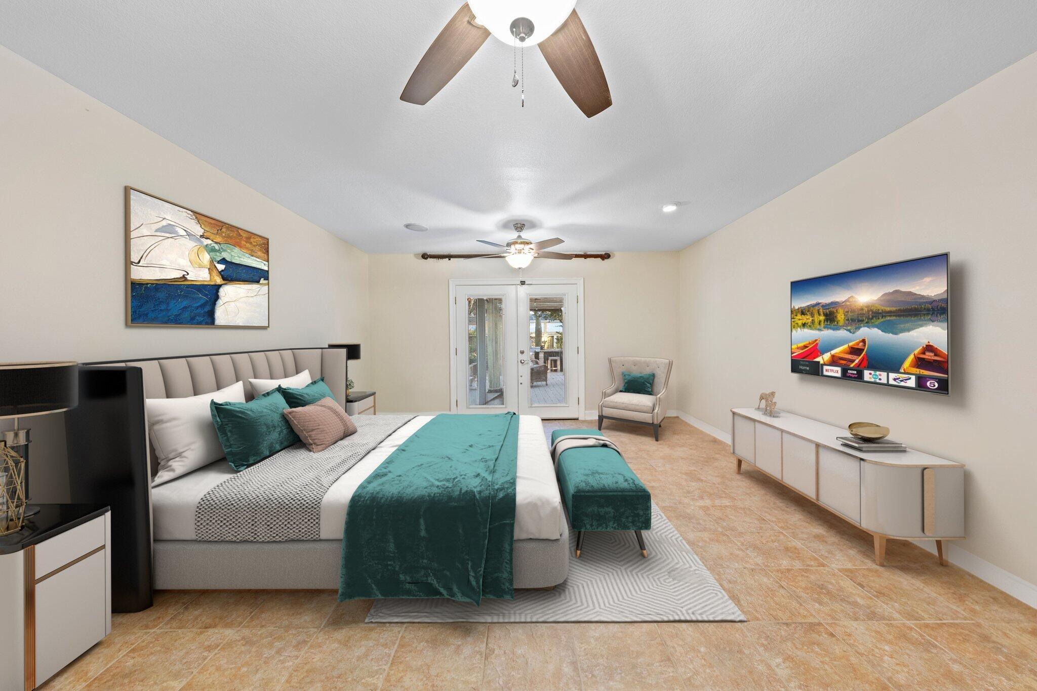 704 Main Street Destin, FL 32541 - Photo 35 of 59 a living room with furniture and a flat screen tv