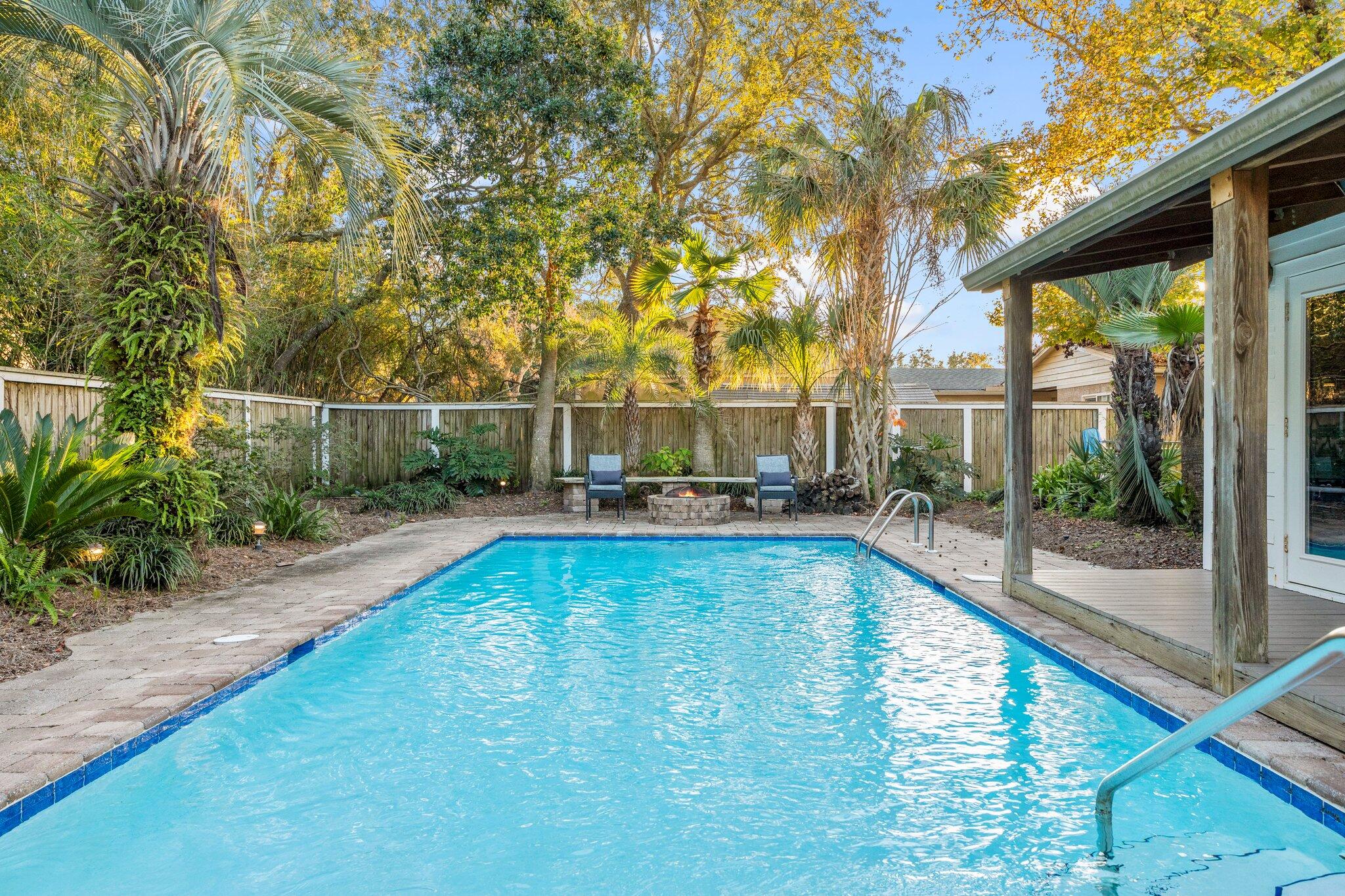 704 Main Street Destin, FL 32541 - Photo 40 of 59 a view of swimming pool with a patio