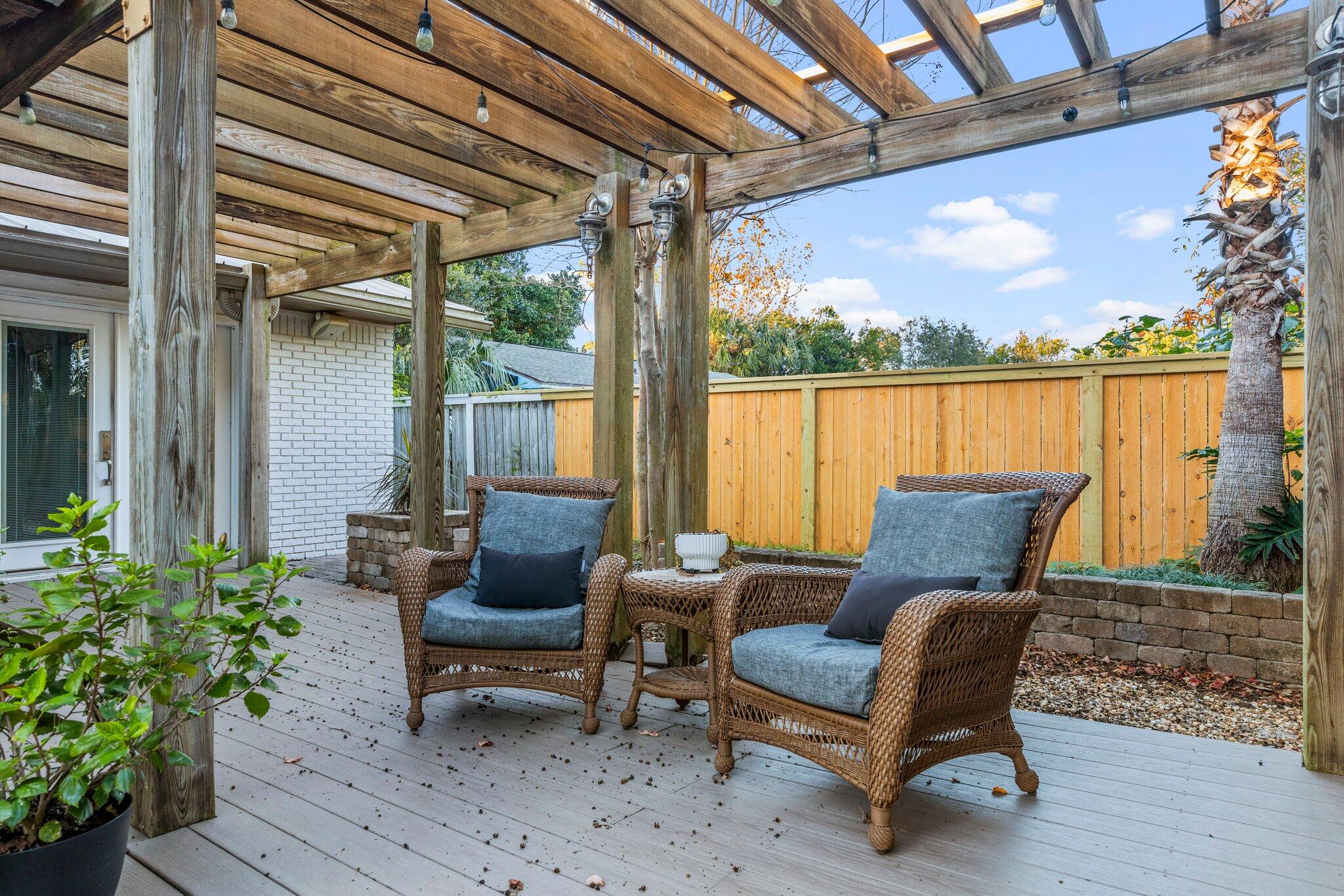 704 Main Street Destin, FL 32541 - Photo 41 of 59 a outdoor living space with furniture and garden view