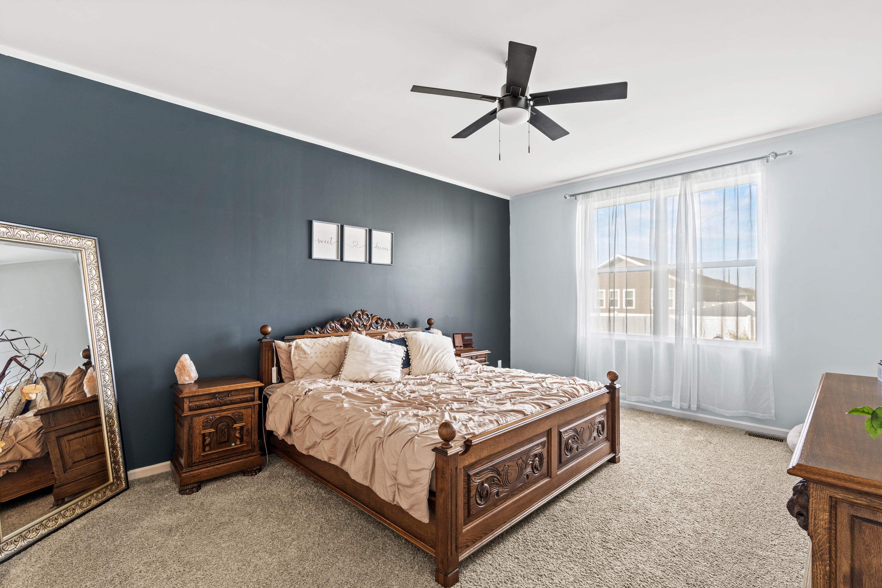 7620 West 105th Place Crown Point, IN 46307 - Photo 12 of 26 a bed room with a bed and a window