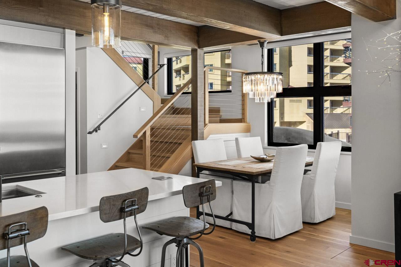 14 Snowmass Road, Unit 308 Crested Butte, CO 81225 - Photo 14 of 40 a view of entryway and hall with wooden floor