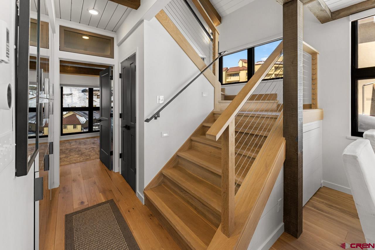 14 Snowmass Road, Unit 308 Crested Butte, CO 81225 - Photo 24 of 40 a view of entryway and hall with wooden floor
