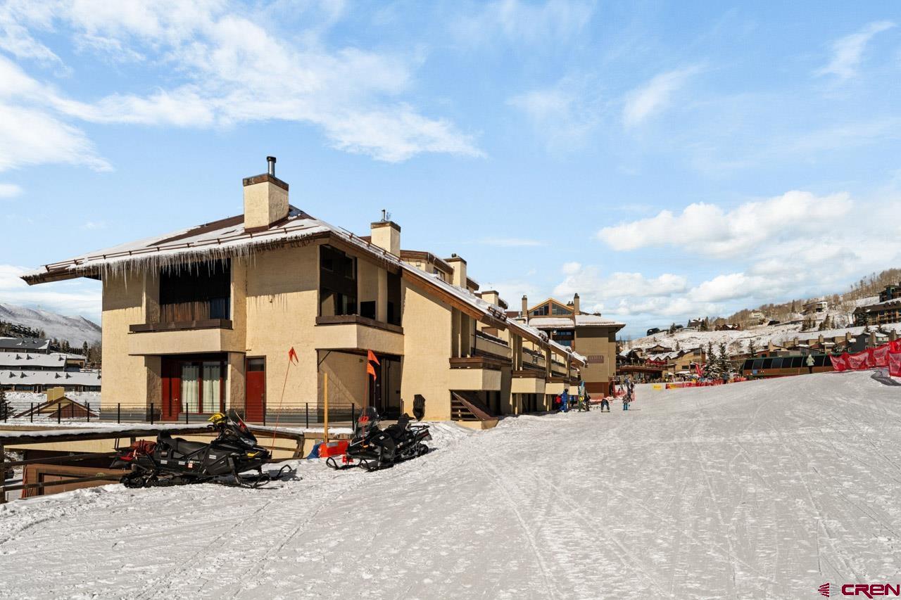 14 Snowmass Road, Unit 308 Crested Butte, CO 81225 - Photo 40 of 40 a view of a street with cars on it