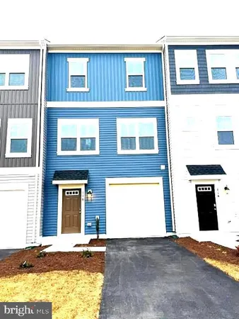 a front view of a building with a entrance