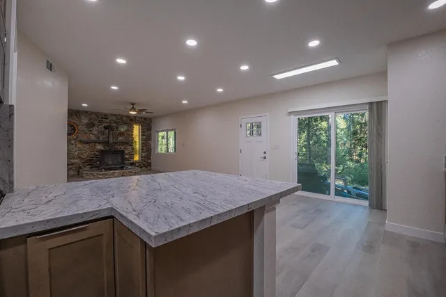 a kitchen with a stove and a microwave