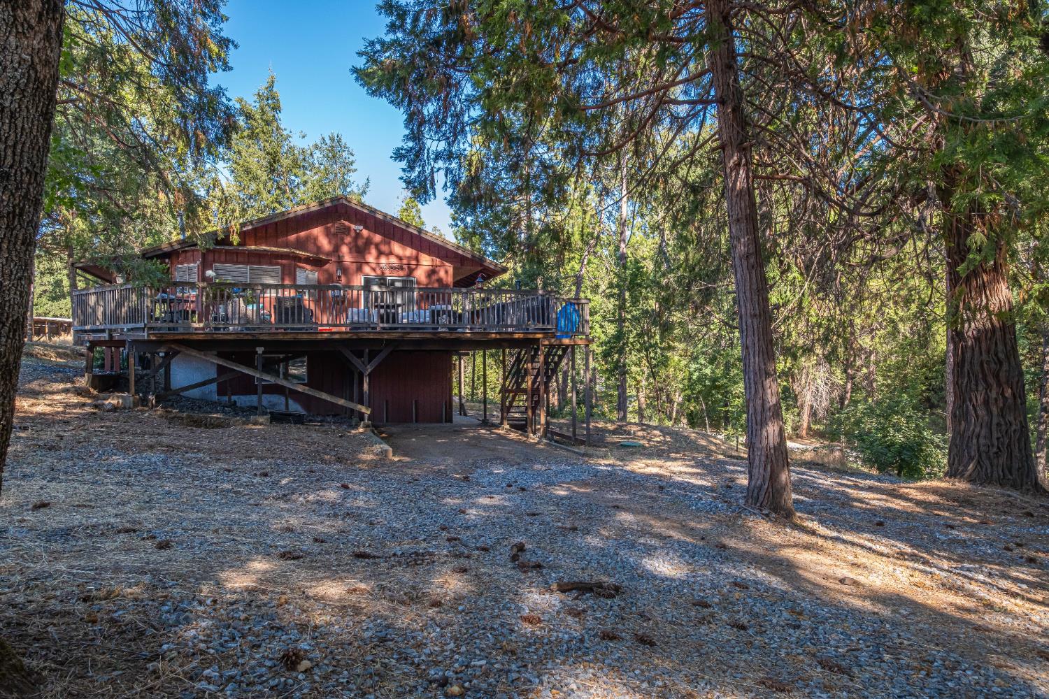 7701 Sly Park Road Placerville, CA 95667 - Photo 2 of 35 a view of a house with backyard and sitting area