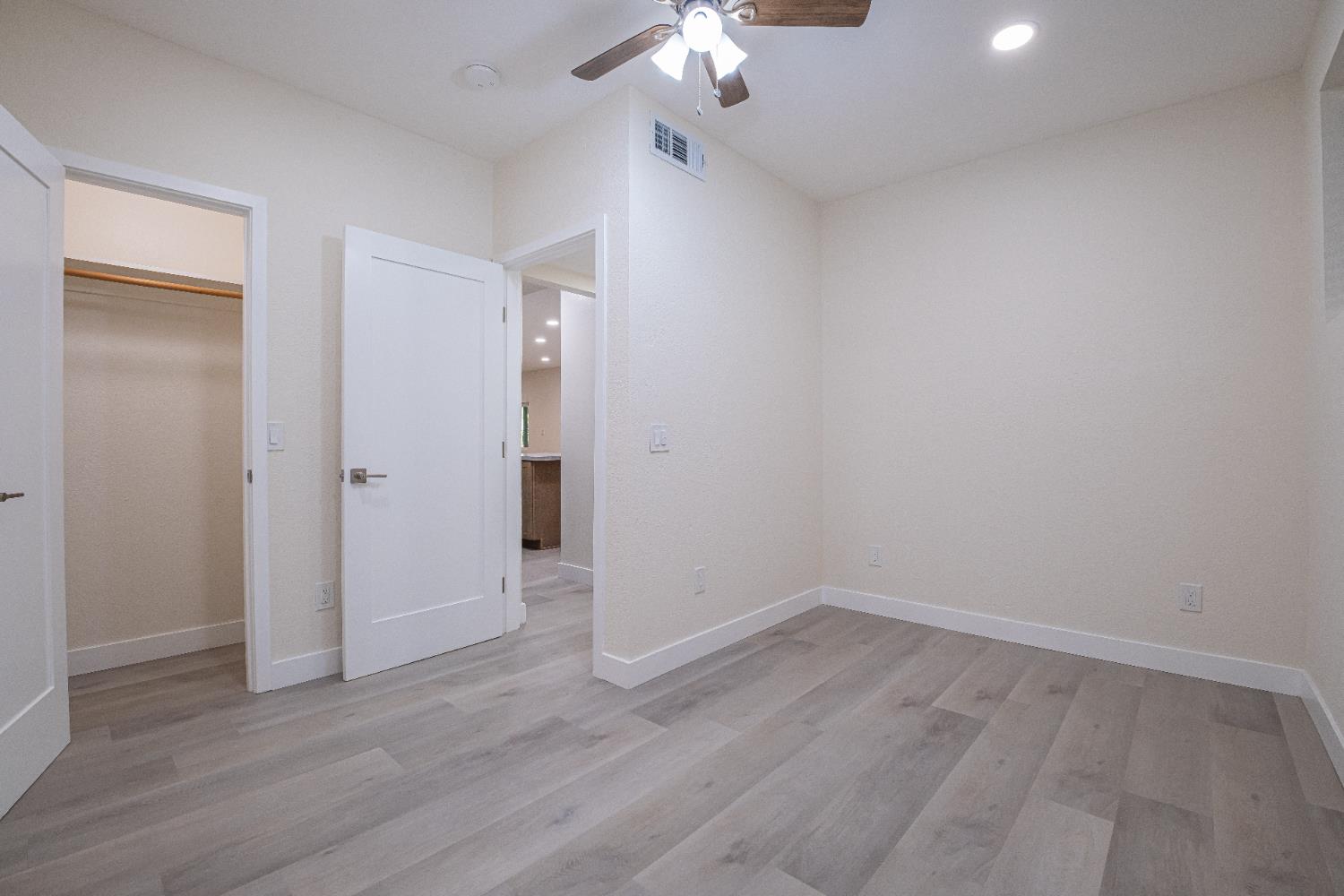 7701 Sly Park Road Placerville, CA 95667 - Photo 25 of 35 a view of a room with wooden floor