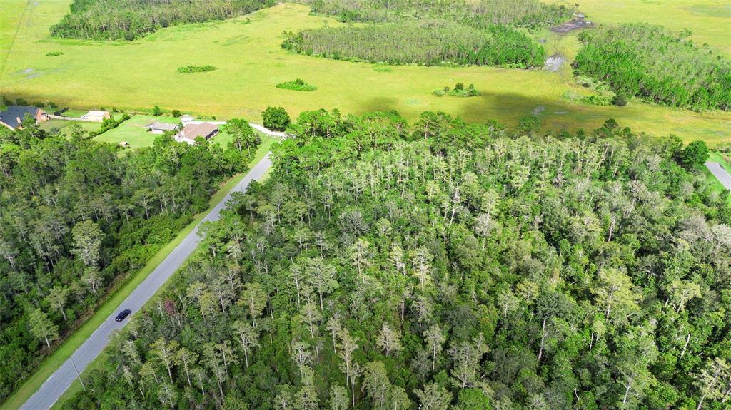 0 Racine Street Orlando, FL 32833 - Photo 4 of 16 a view of an outdoor space and a lake view