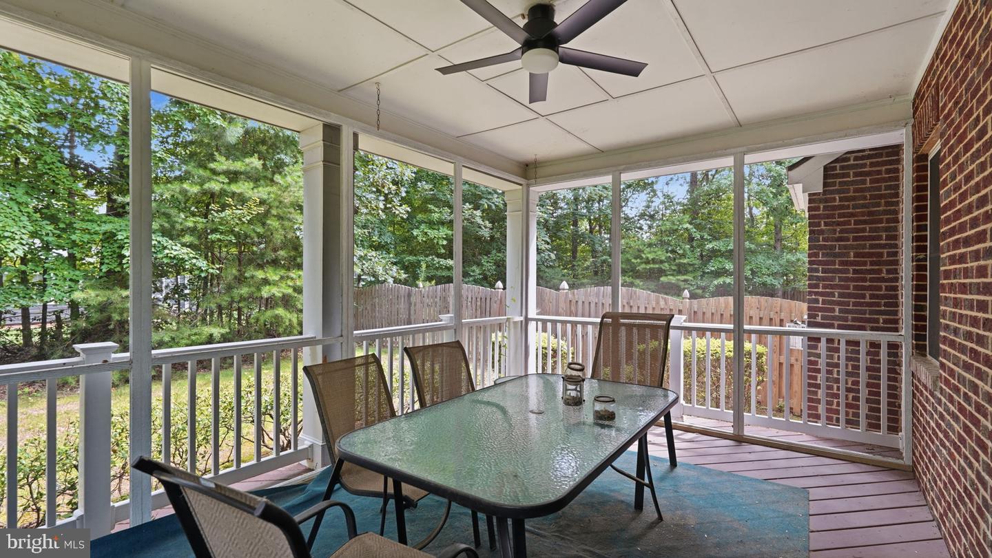 13301 Dumfries Road Manassas, VA 20112 - Photo 45 of 49 Serene screened porch with nature views.