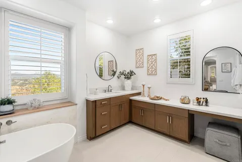 a view of storage and utility room with washer and dryer