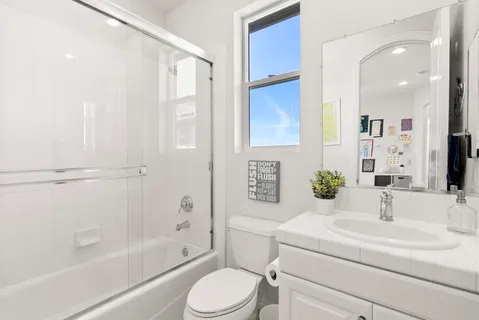 an aerial view of residential building with parking space