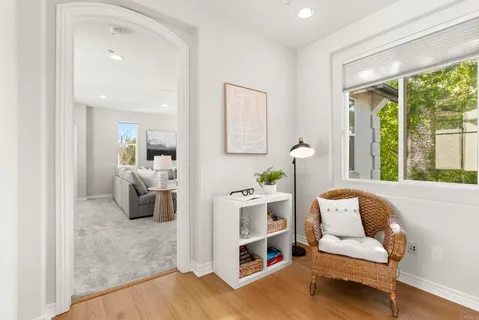 an aerial view of a house with a lake view