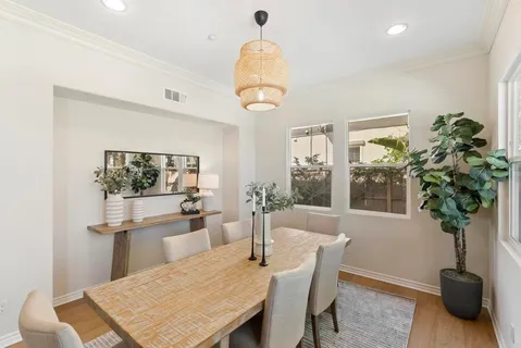 a kitchen that has a lot of cabinets in it