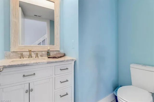 a view of staircase with white walls and white walls