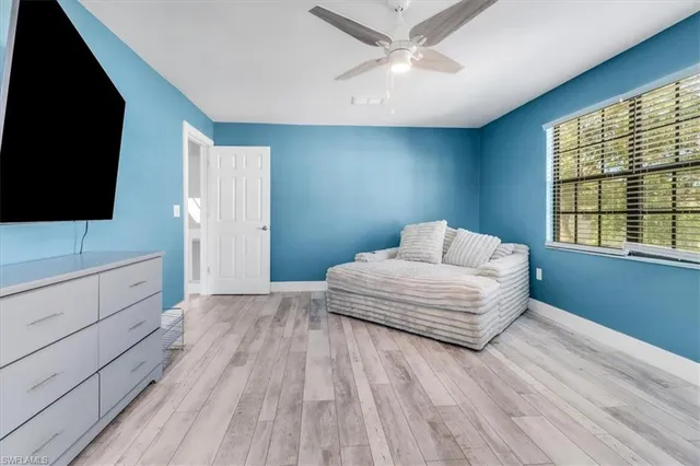a bathroom with a sink a mirror and a shower