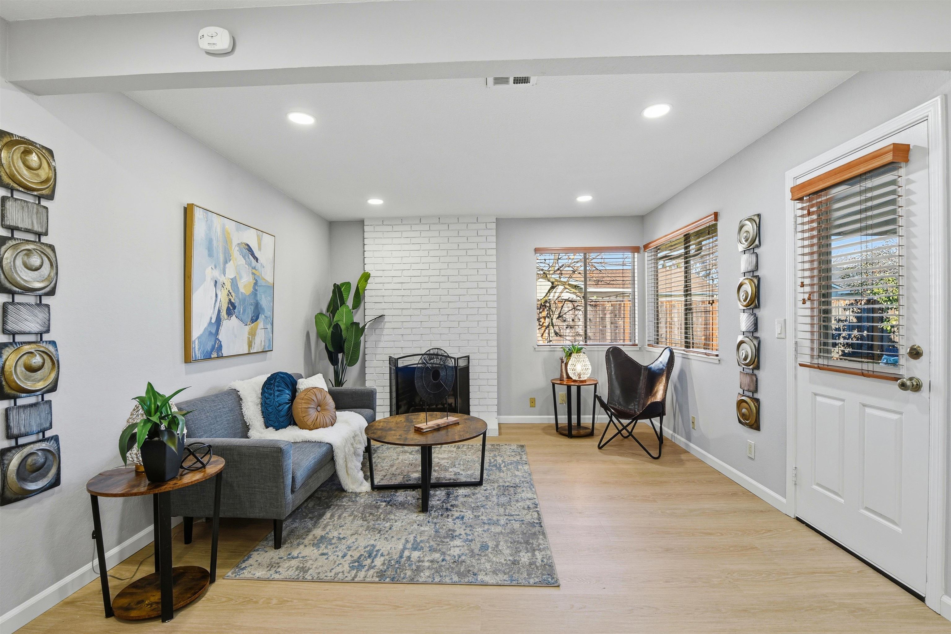 37768 Rockspray Street Newark, CA 94560 - Photo 17 of 34 a living room with furniture and a potted plant