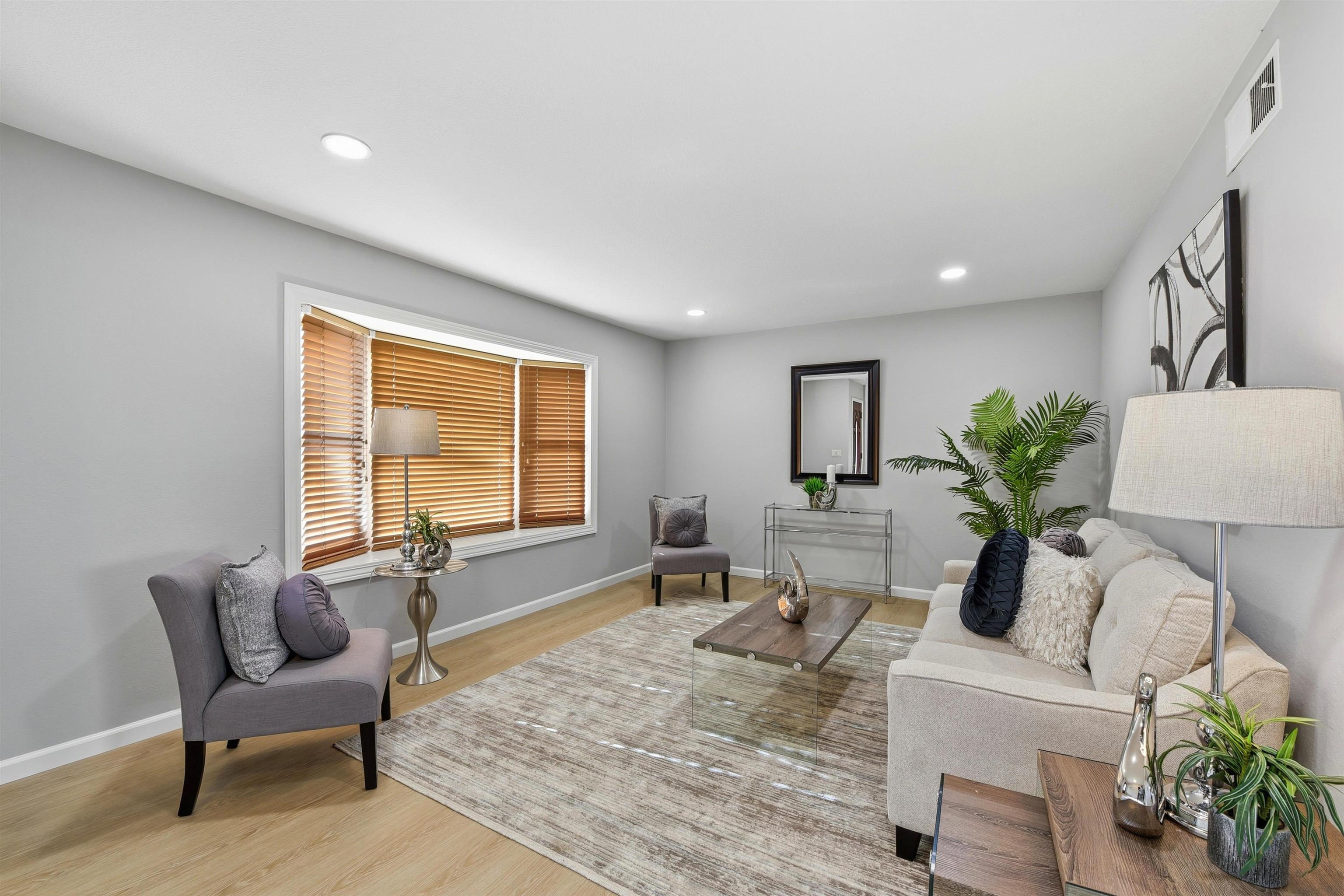 37768 Rockspray Street Newark, CA 94560 - Photo 3 of 34 a living room with furniture and a potted plant