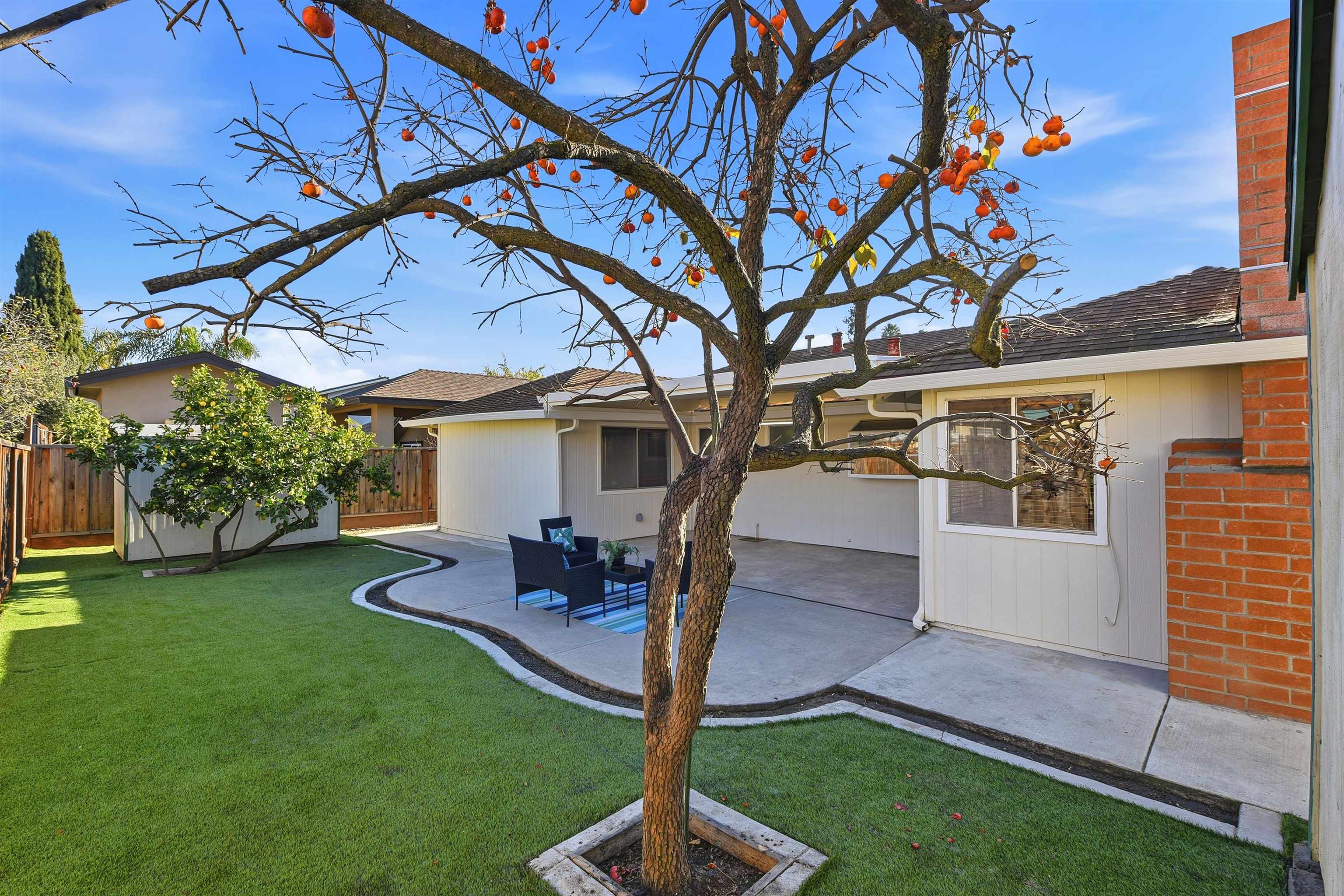37768 Rockspray Street Newark, CA 94560 - Photo 33 of 34 a patio with a yard table and chairs